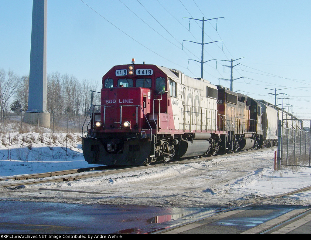 SOO 4419 scoots down the homestretch after the coal train clears